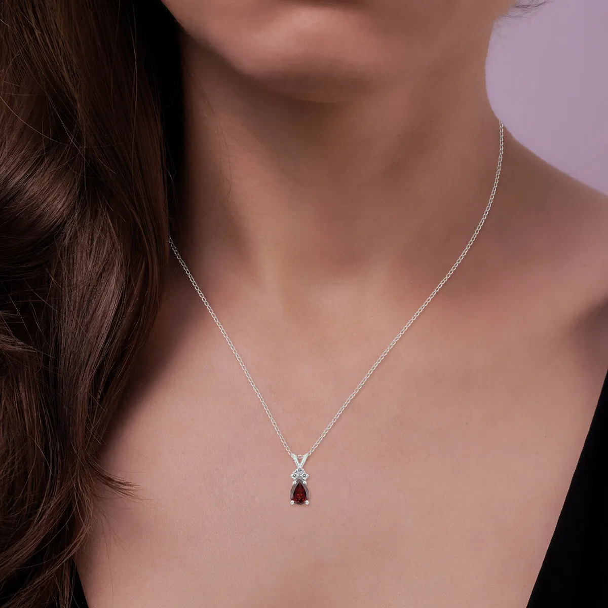 14K White Gold 7X5Mm Pear Garnet And Three Stone Diamond Pendant