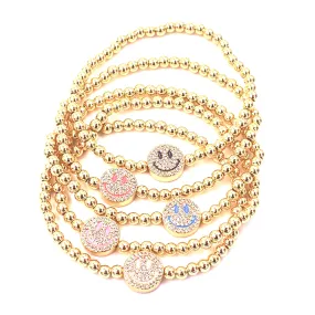 Ashley Gold Stainless Steel Gold Plated Beaded Stretch Ball Smile Bracelet