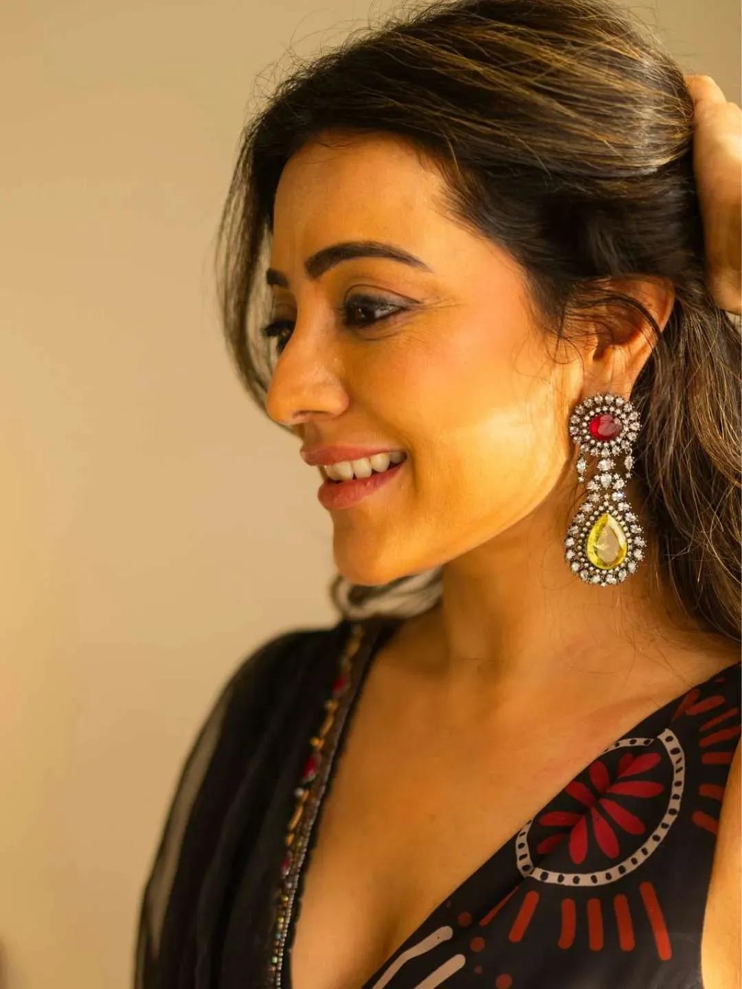 Nisha Aggarwal In Purple Statement Earring