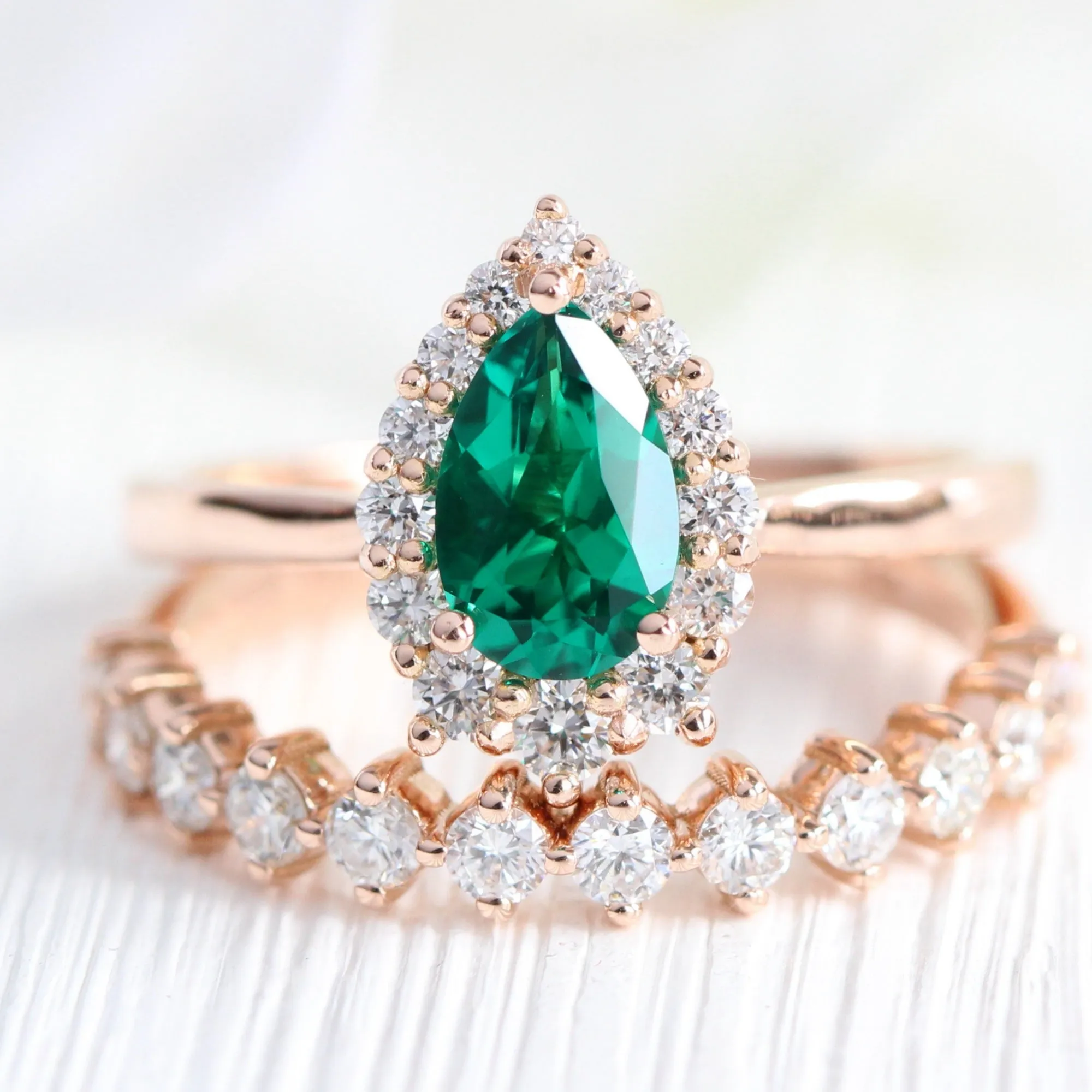 Pear Emerald Engagement Ring in Tiara Halo Diamond Tapered Band