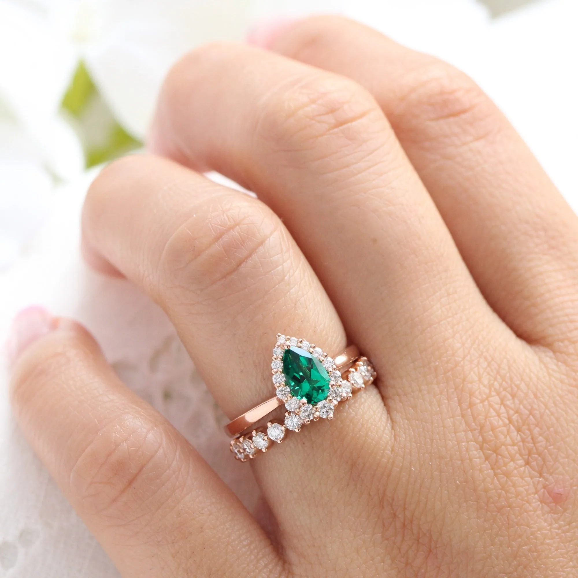 Pear Emerald Engagement Ring in Tiara Halo Diamond Tapered Band