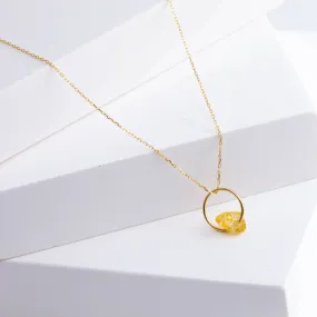 Rough stone gold grossular garnet pendant